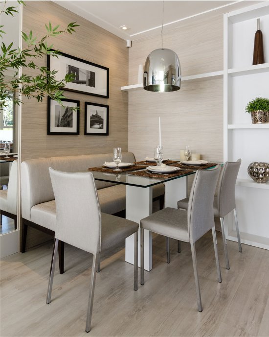 Dining table in a small high-tech kitchen-living room