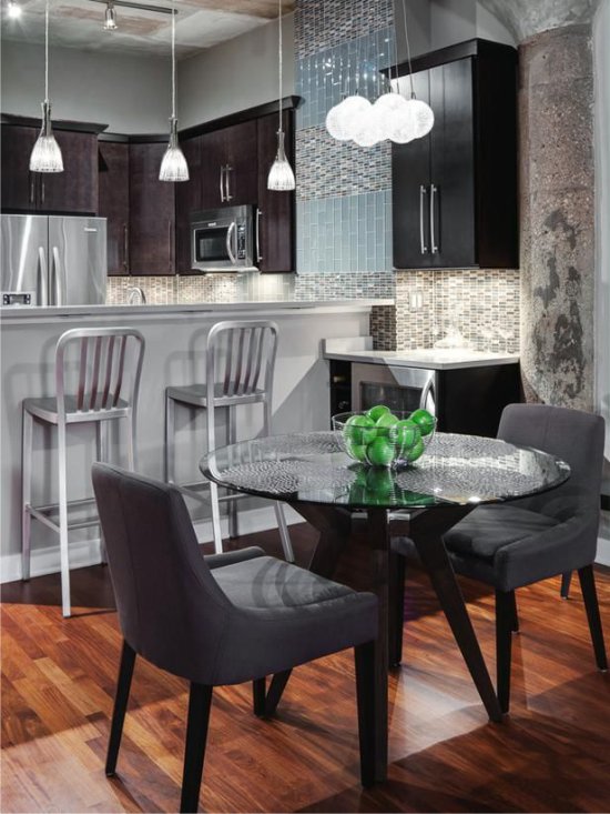 Dining table in a small high-tech kitchen