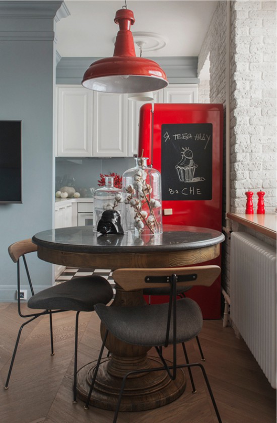 Kitchen in Khrushchev with red fridge