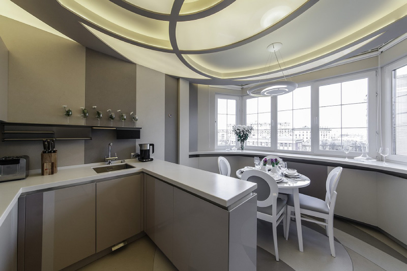 Unusual design plasterboard ceiling in the kitchen