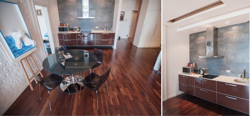 Walnut floorboard in the interior of the kitchen in the studio apartment