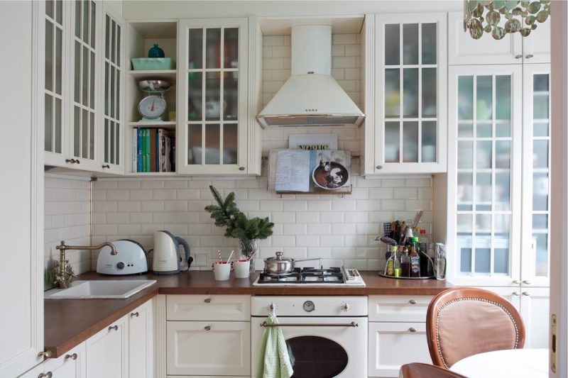 White kitchen with wooden countertop