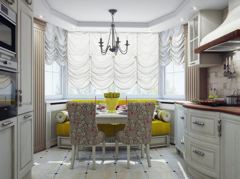 Kitchen with a bay window in a typical house P-44T in a classic style