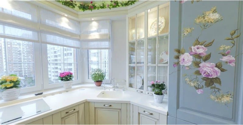 Kitchen with a working area in the bay window