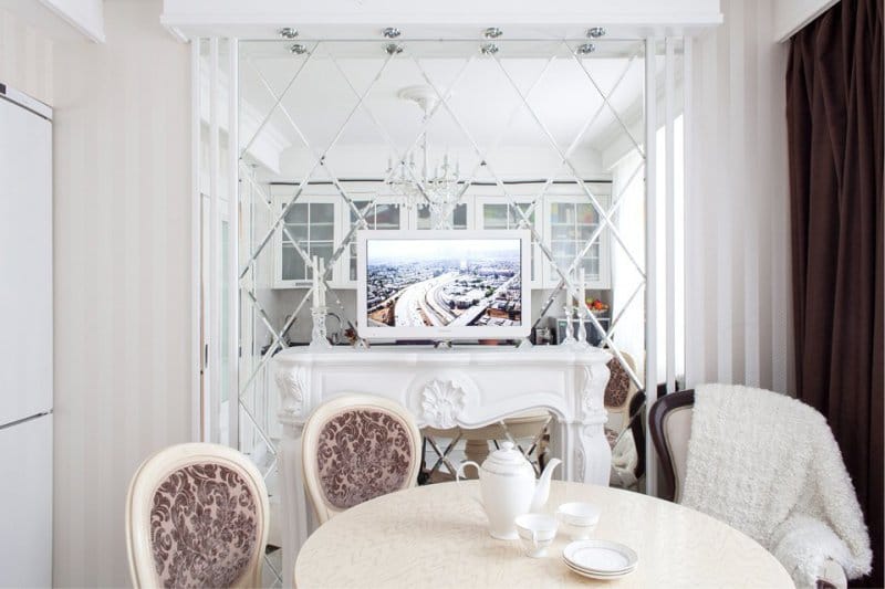 Wallpaper in the interior of a small white kitchen in a classic style