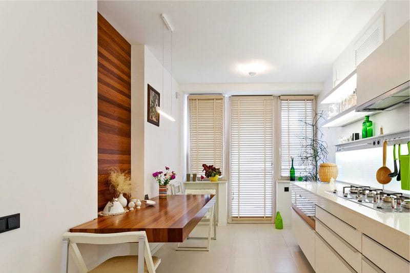 The walls in the interior of the kitchen in the style of minimalism - a tree in the dining area