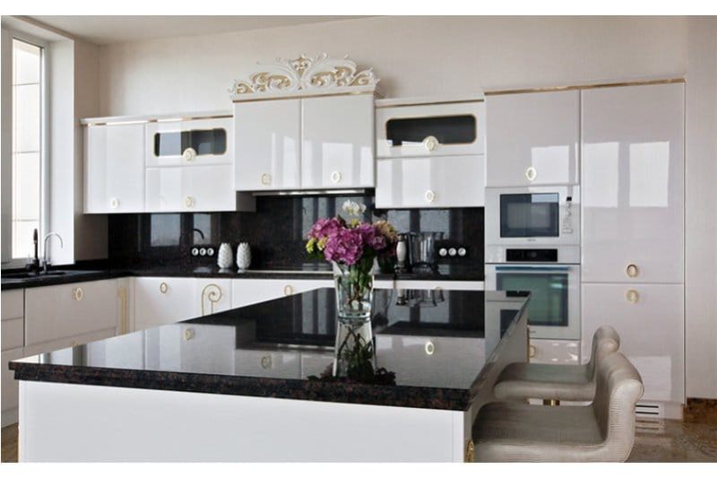 Black stone countertop in the neoclassical style kitchen