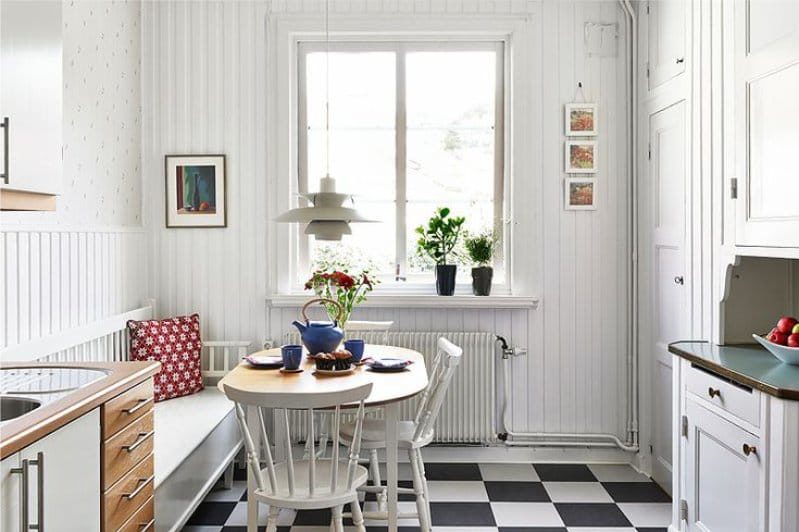 Black and white tile floor in a Scandinavian country kitchen