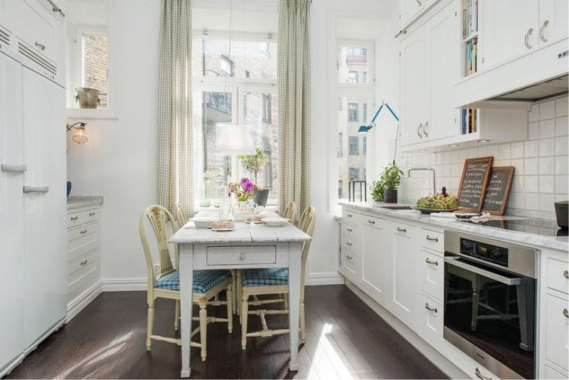 Wooden table in the interior of a small kitchen