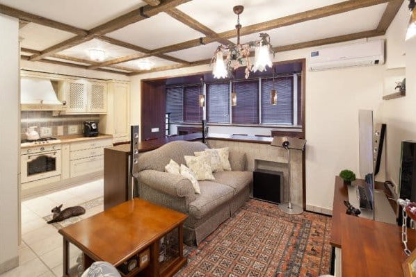 Kitchen-living room, with a bar on the loggia