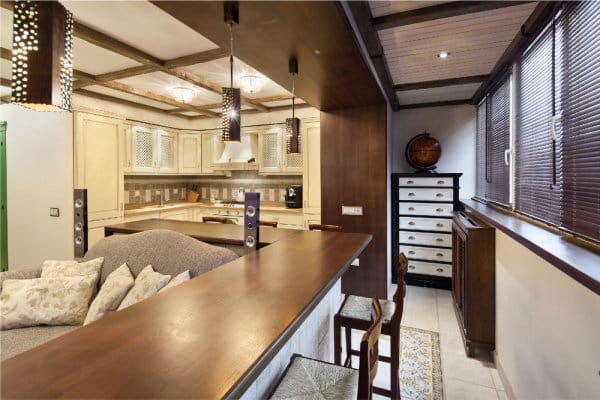 Kitchen-living room, with a bar on the loggia