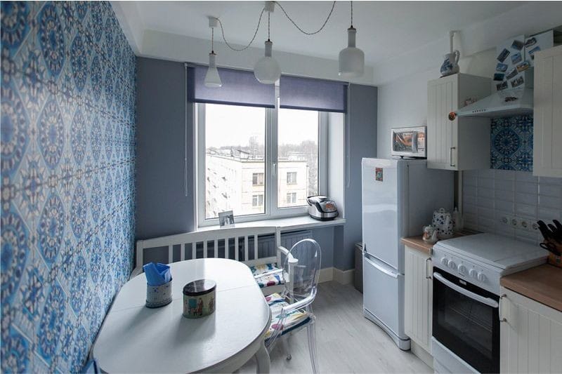 Oval table in the interior of a small kitchen