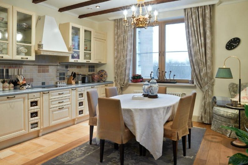 Ceiling beams in the interior of the kitchen in a classic style