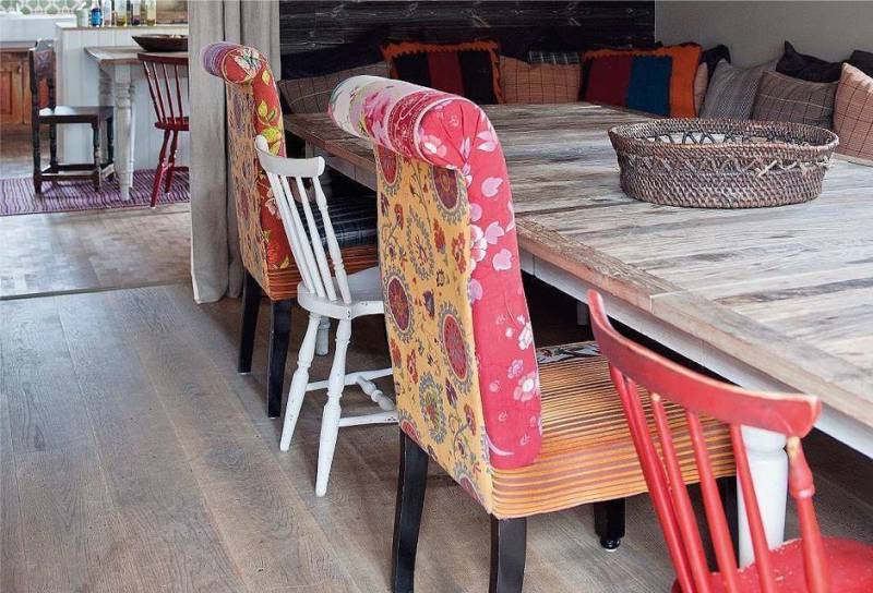 Different chairs in a rustic-style kitchen