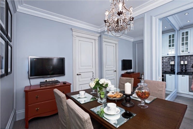 The interior of the kitchen-dining room with gray walls