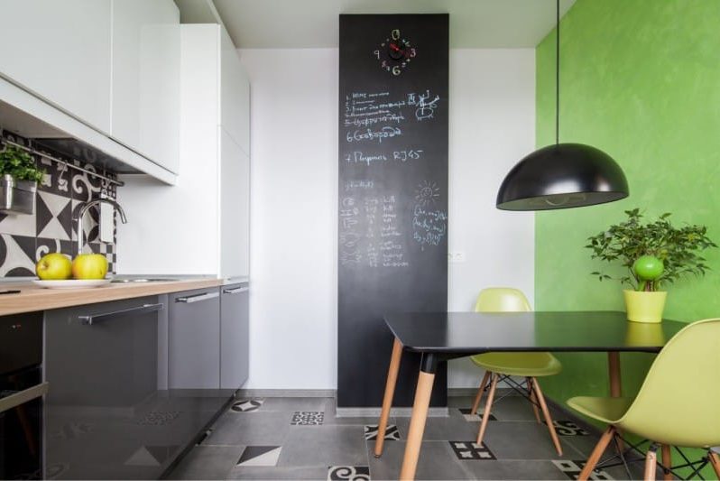 Gray floor of tiles in the interior of the kitchen