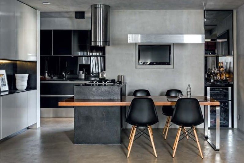 The combination of black and gray in the interior of the kitchen