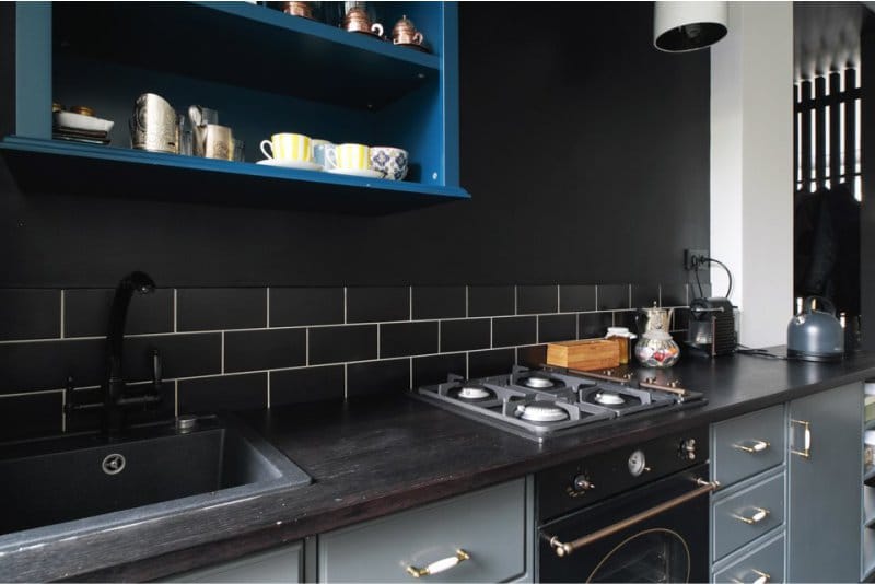 Dark gray kitchen with red accents