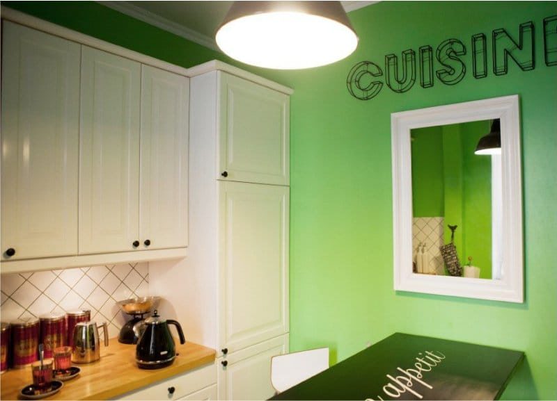 Green kitchen in the interior