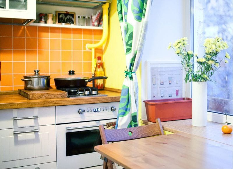 Yellow and green color in the interior of the kitchen