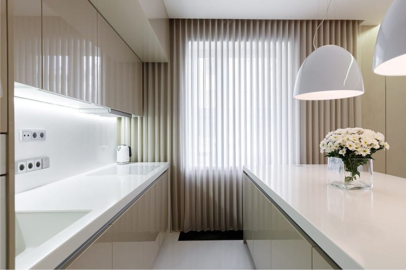 White and beige in the interior of the kitchen in a modern style.