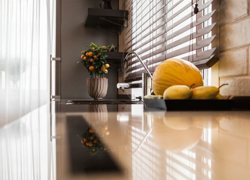 Wooden blinds in the interior of the kitchen