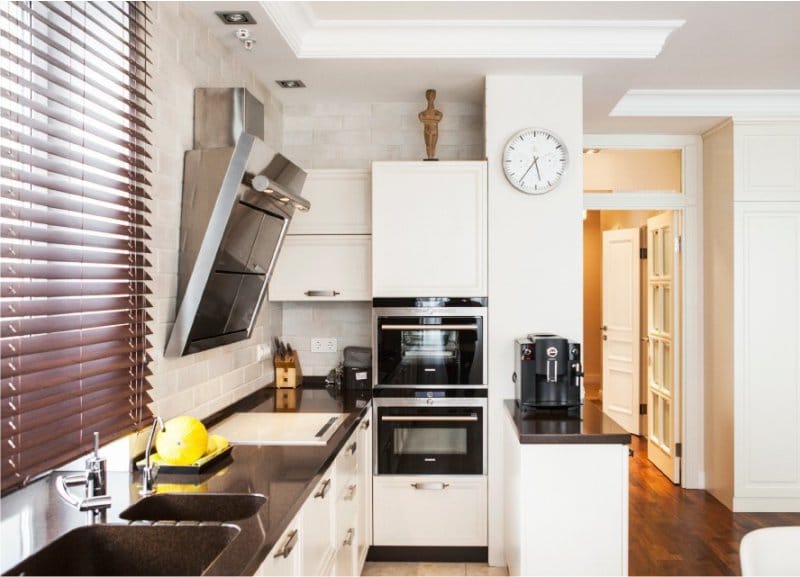 Wooden blinds in the interior of the kitchen