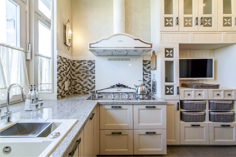 Light beige kitchen in classic style