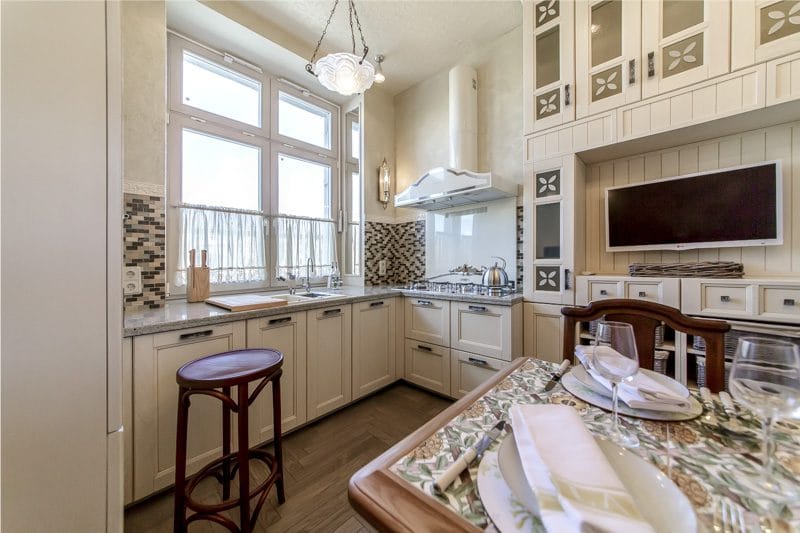 Light beige kitchen in classic style