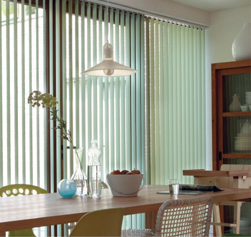 Vertical blinds in the dining room interior