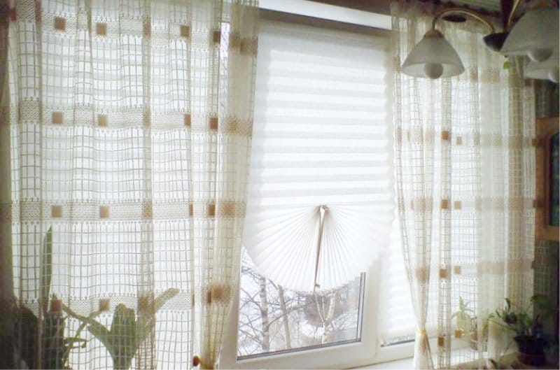 Blinds of wallpaper in combination with curtains