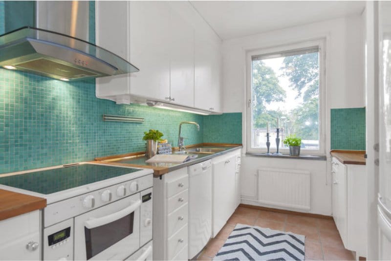 Apron of blue color in an interior of kitchen