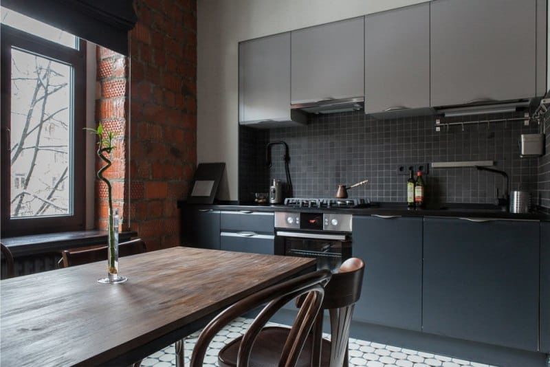 Mur de briques à l'intérieur d'une cuisine de style loft