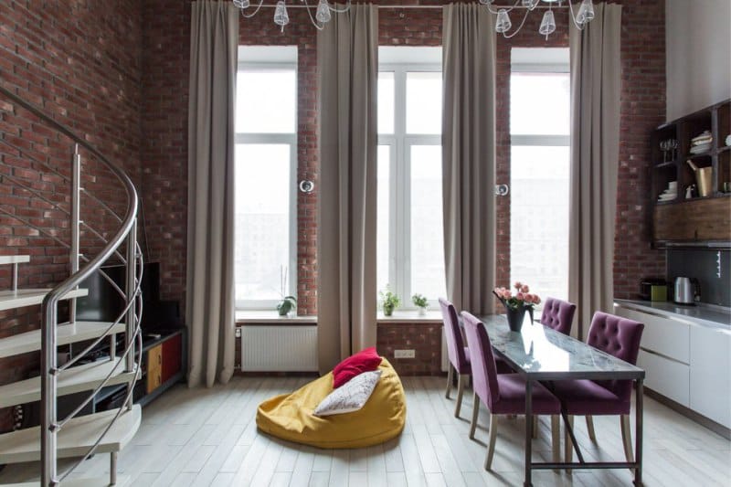 Modern furniture in the interior of a loft style kitchen