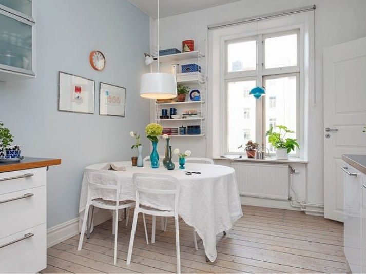 Light blue walls in the interior of the kitchen