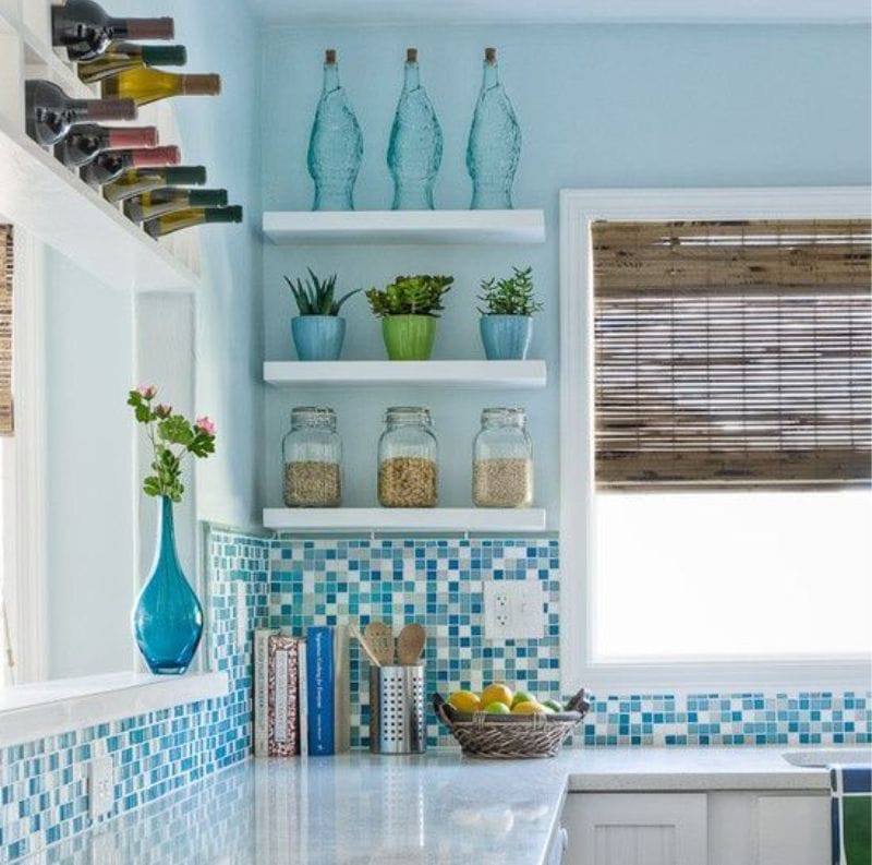 Mosaic apron in the interior of the kitchen in the marine style