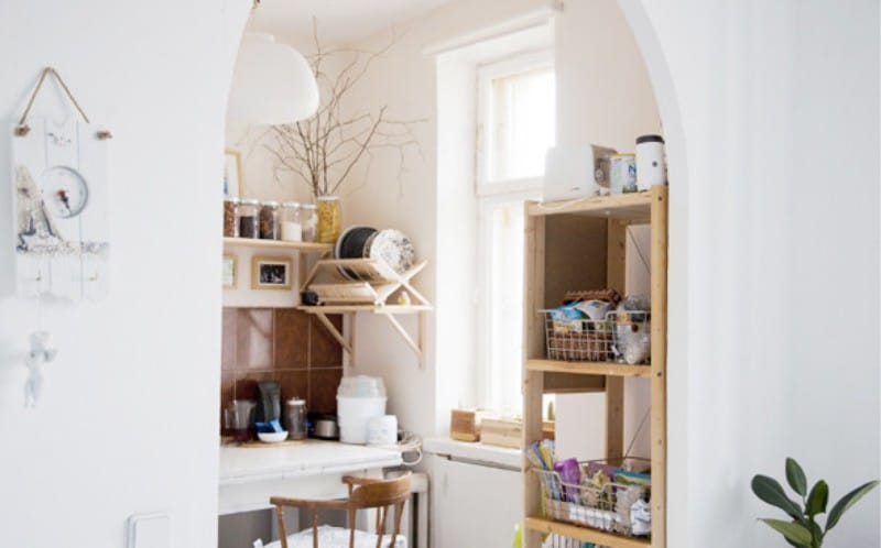 Romanesque arch between the kitchen and living room