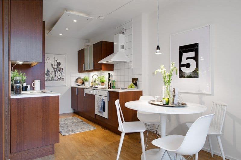 Wooden kitchen of a brown shade in an interior