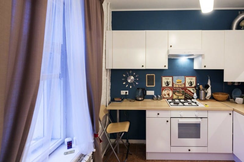 Brown curtains in the interior of the kitchen