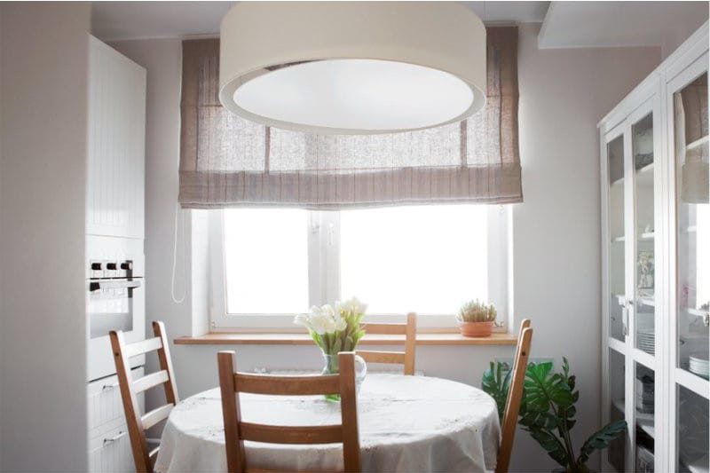 Brown curtains in the interior of the kitchen