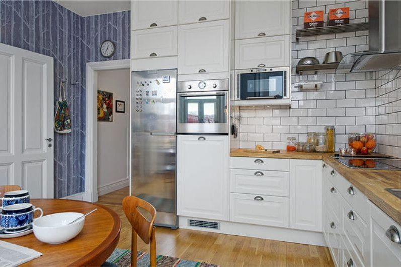 Wallpaper blue in the interior of the kitchen