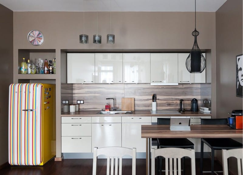 Brown walls in the kitchen-living room interior