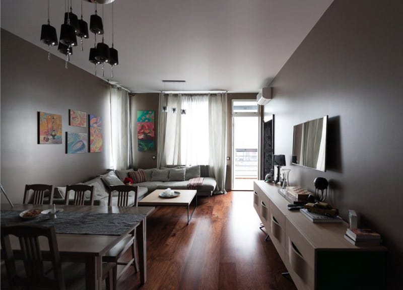 Brown walls in the kitchen-living room interior