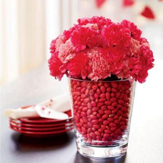 Vase with beans and flowers