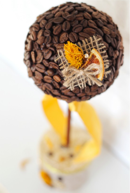 Coffee topiary decorated with orange slice