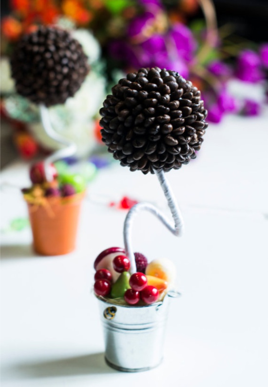 Topiary with fruit in a bucket