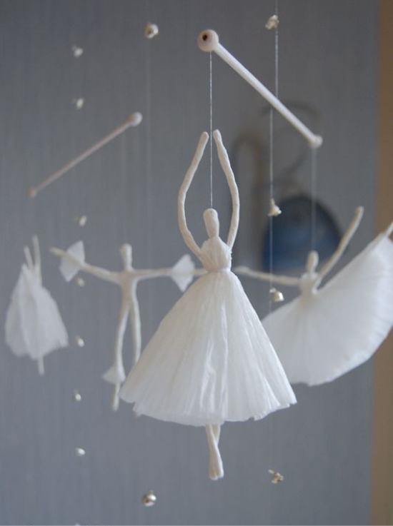 Ballerinas from paper napkins on the mobiles