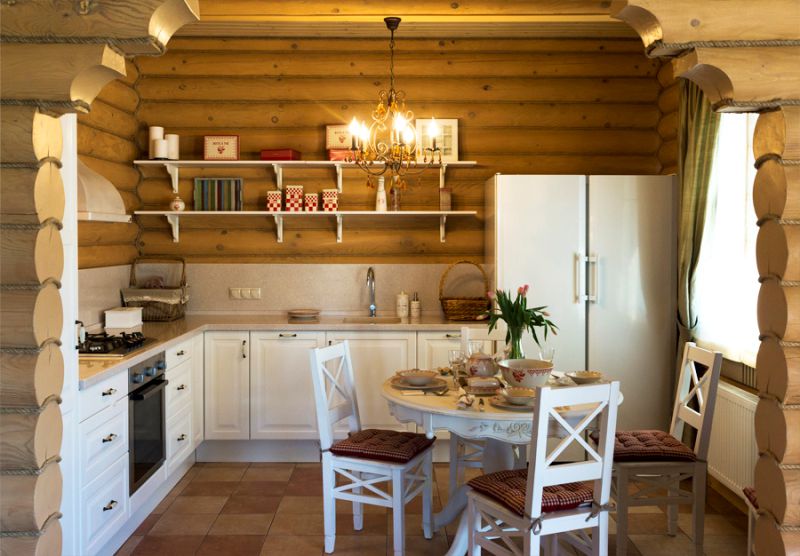 Arch in the kitchen in a private house from log cabins