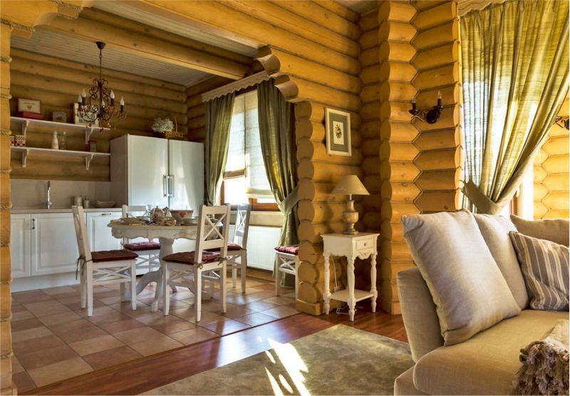 Arch in the kitchen in a private house from log cabins