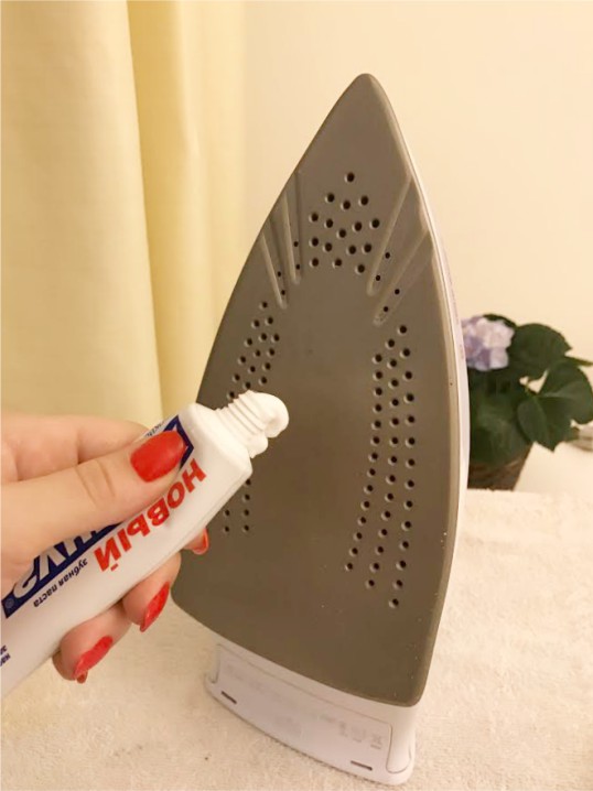 Iron sole cleaning with toothpaste